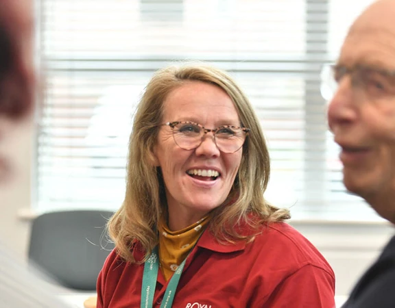 A volunteer working as part of a group
